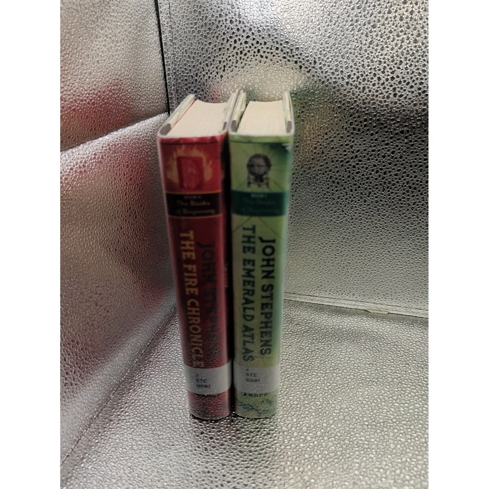 LOT 2 THE BOOKS OF BEGINNING:1 EMERALD ATLAS; 2 FIRE CHRONICLE BY JOHN STEPHENS